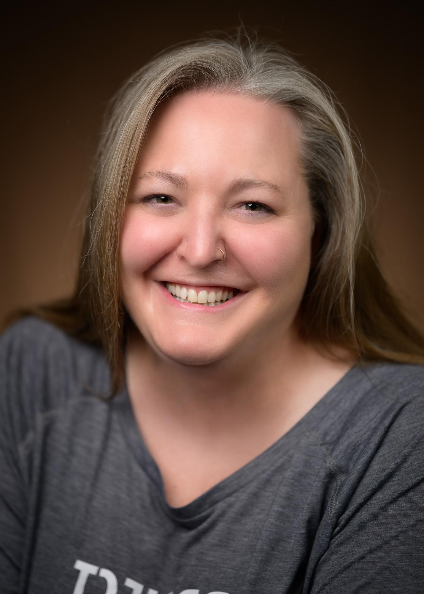 A headshot of a women